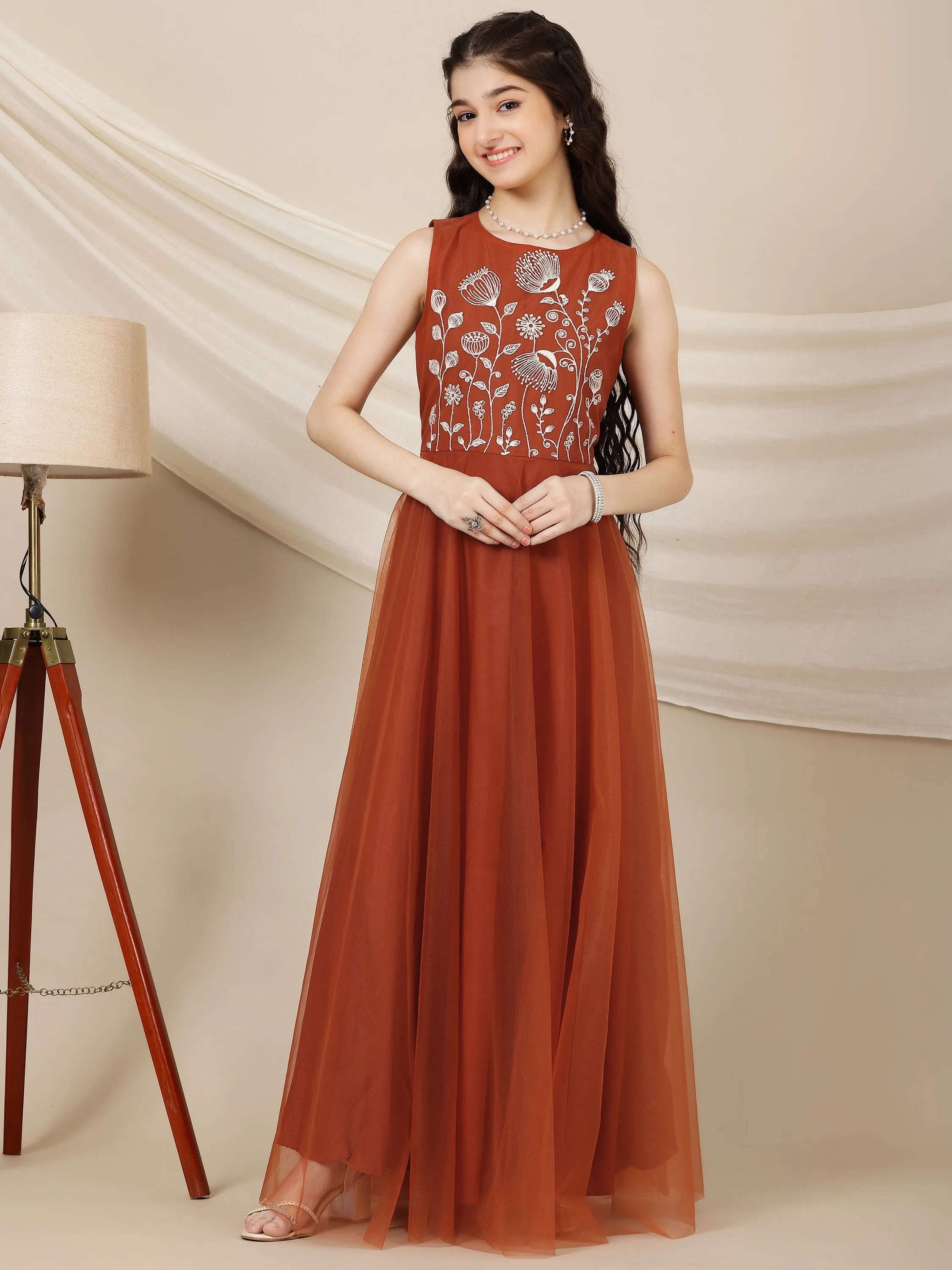 Certainly! Here’s an optimized title for your e-commerce product:

Elegant Embroidered Ethnic Maxi Dress with Intricate Designs and Flowing Silhouette

Feel free to let me know if you need further adjustments!