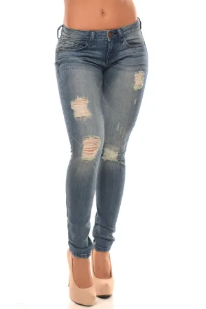 Low Rise Medium Wash Distressed Skinny Jean