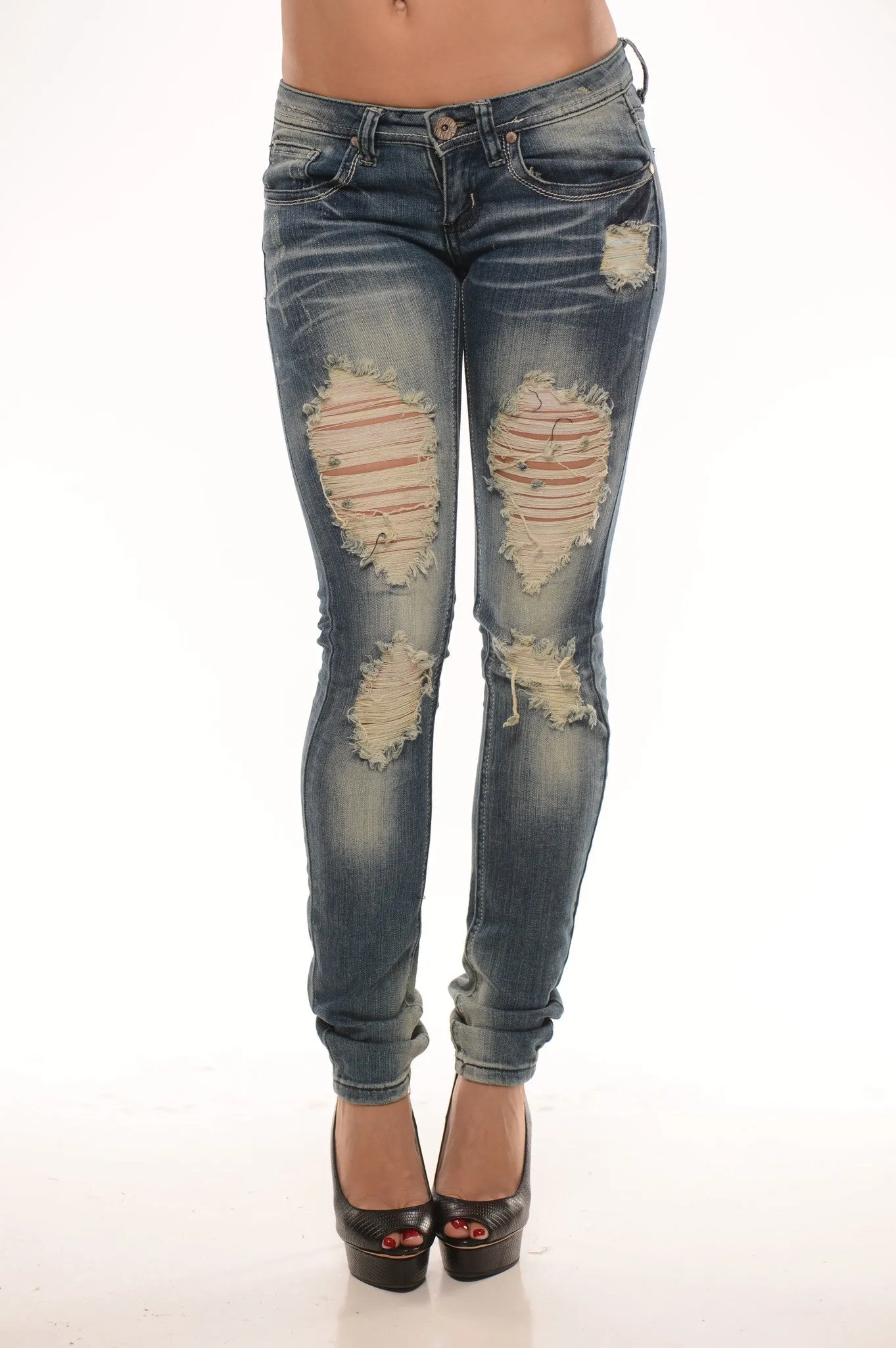 Totally Distressed Low Rise Skinny - Medium Wash